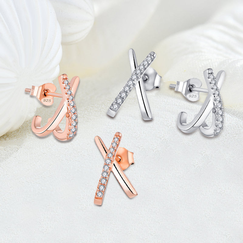 Discover Radiant Elegance with Geometric Cross X Zirconia Earrings