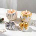 Gold and silver festive round ornament castings with candles and bow lids