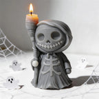 Close-up of a gray robed skeleton holding its molded broom