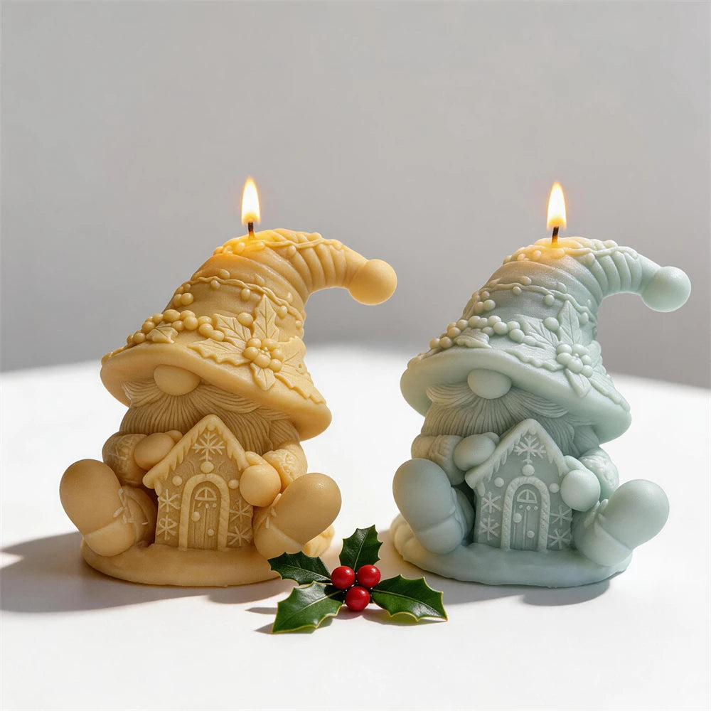 Cream and green gnome candles beside Christmas decorations