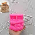 Pink silicone mold for Christmas gift sack candle with ribbon bow