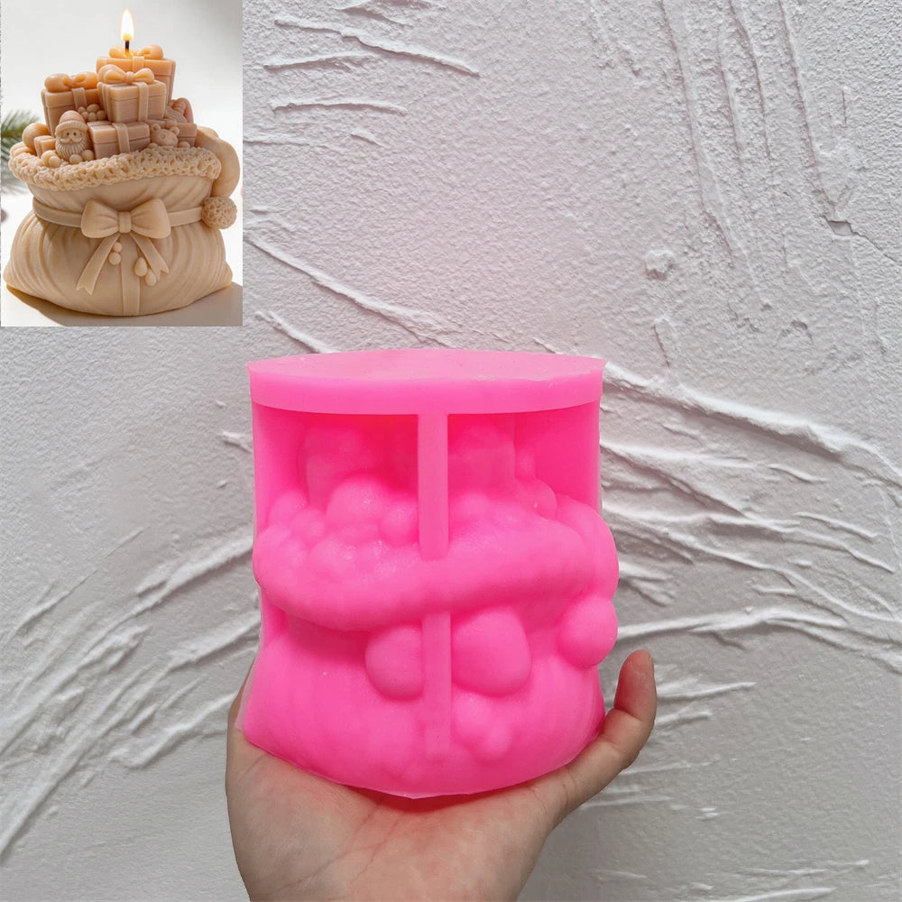 Pink silicone mold for Christmas gift sack candle with ribbon bow