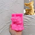 Pink silicone mold for seated reindeer decorative candle