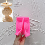 Pink silicone mold for the single-globe snowflake pedestal shown open in a hand