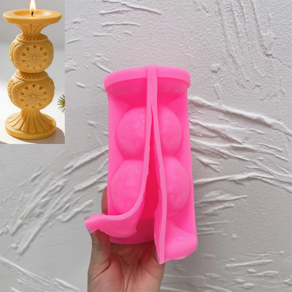 Pink silicone mold for the double-globe snowflake pedestal beside a finished sample