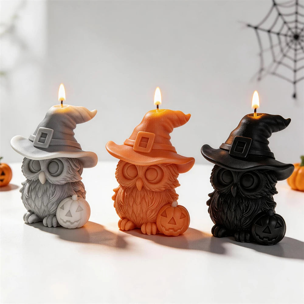 Three Halloween owl castings with textured feathers