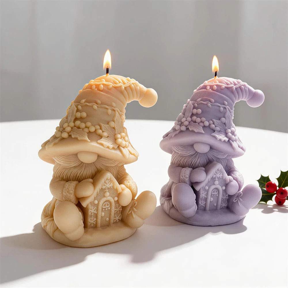 Cream and lilac gnome candles with long beards and decorated houses