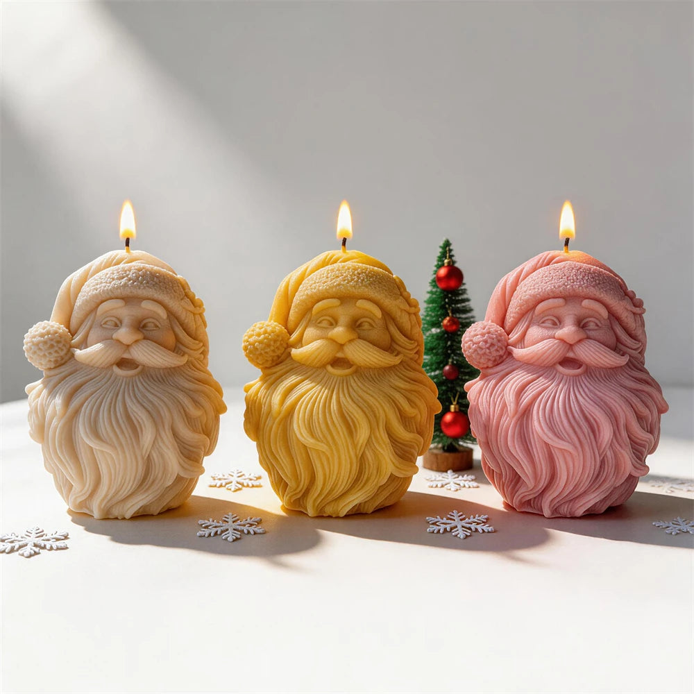 Cream yellow and pink Santa face candles with flowing beards