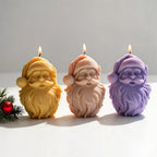 Yellow cream and lilac Santa face candles