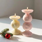 Cream single-globe and pink double-globe snowflake pedestal candle samples