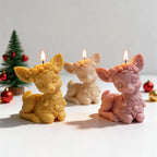 Yellow white and pink reindeer candles with floral forehead detail