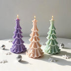 Purple, peach and green scalloped-tier Christmas tree candles