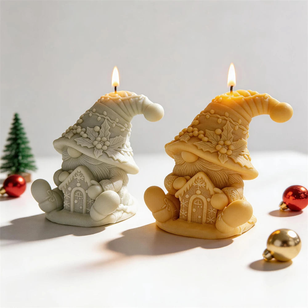 Two seated gnome candles with house details and rounded boots