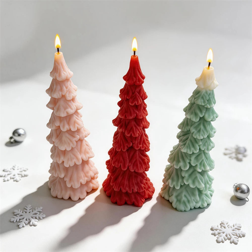 Cream red and green tiered Christmas tree candles with snowflake props
