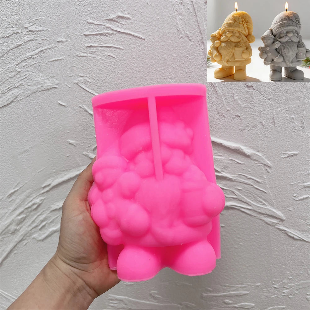 Pink silicone mold for Christmas gnome holding gingerbread figure