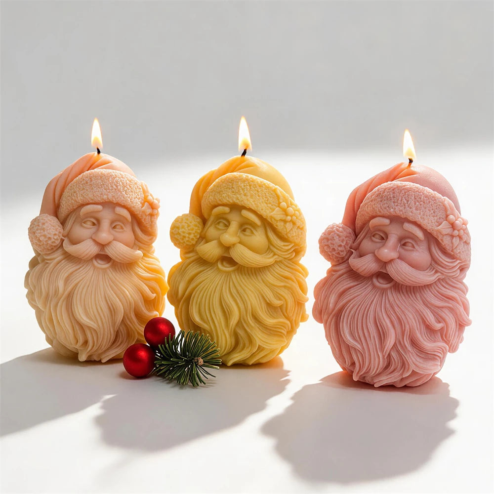 Three Santa portrait candles showing curled moustaches and pom-pom hats