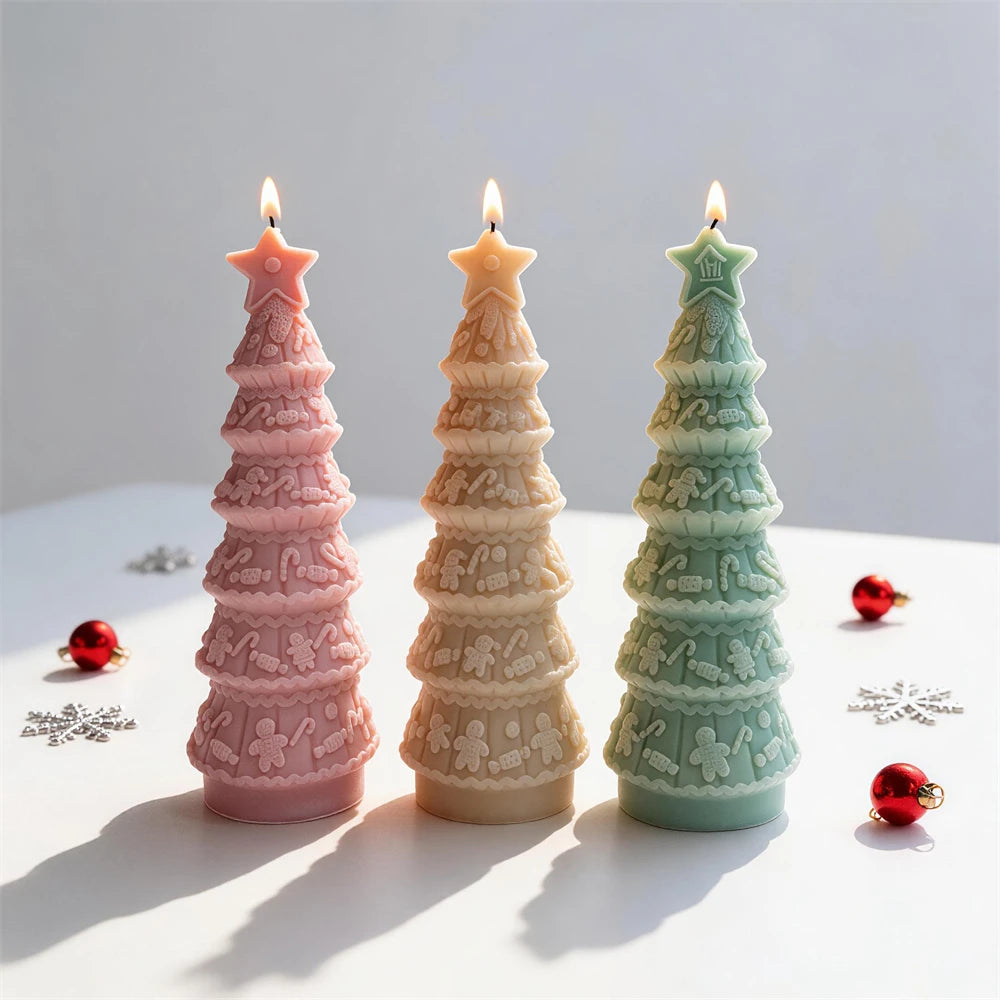 Pink, cream and green decorated tree candles with icing-style bands