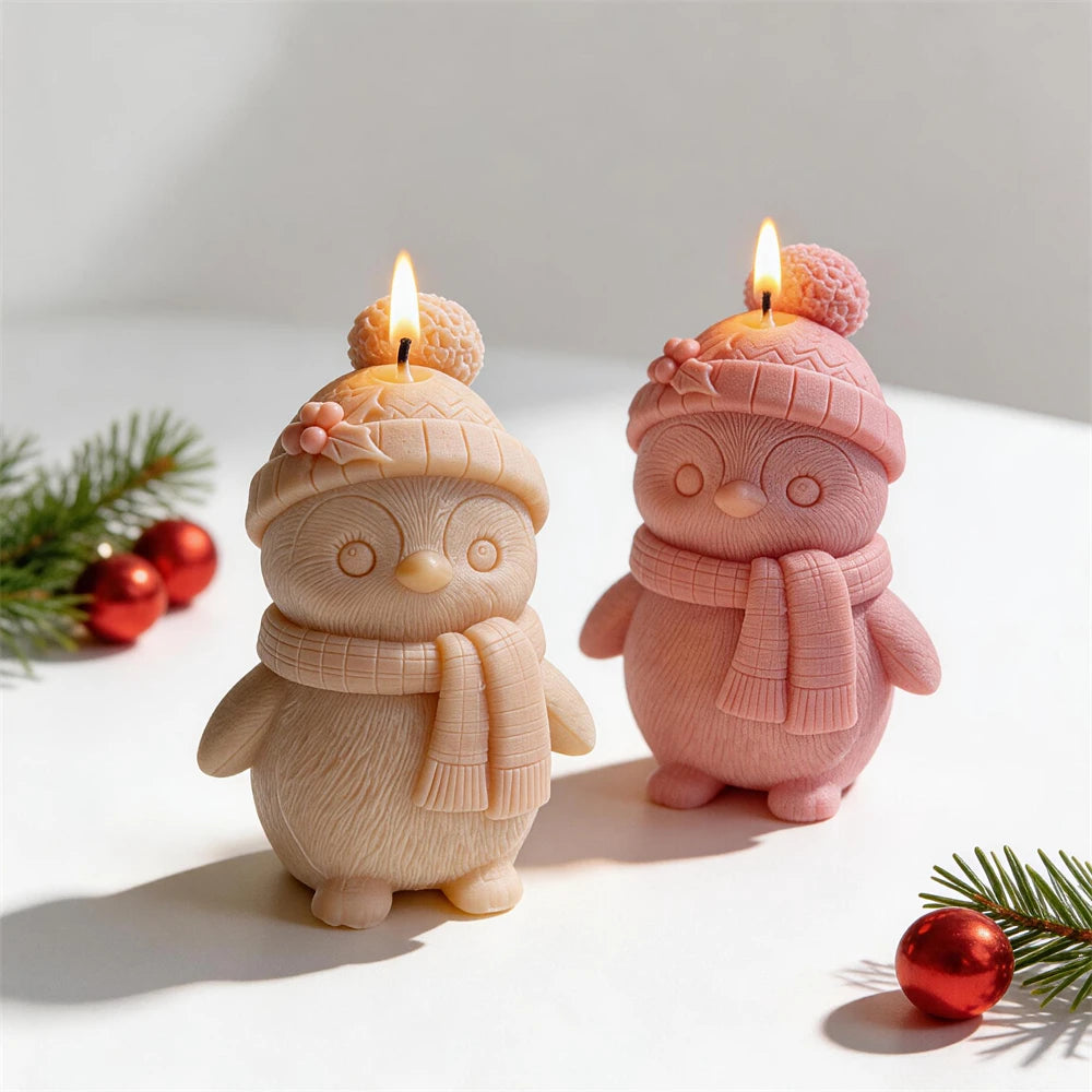 Cream and pink bird figures with textured bodies and long scarves