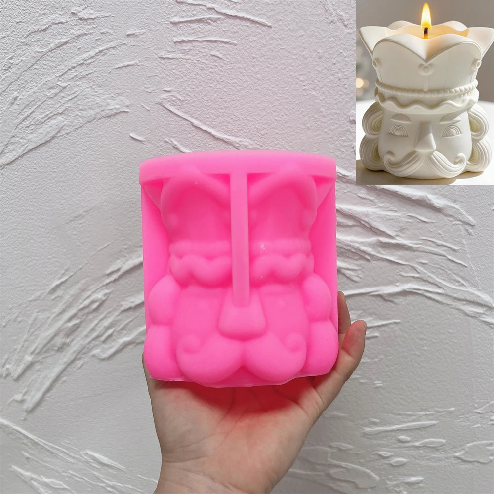 Pink silicone nutcracker head vessel mold held in a hand