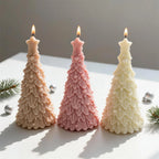 Peach, pink and cream Christmas tree candles topped with stars