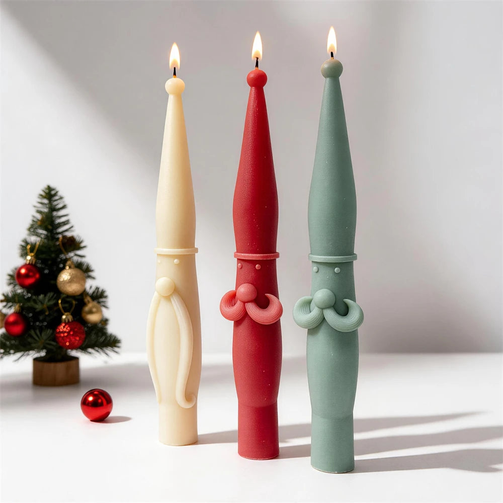 Three lit 30 cm Santa-inspired taper candles with long beard and moustache details