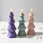 Tiered tree candles with raised bows on each level