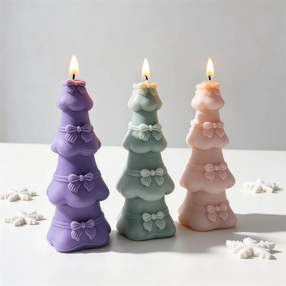 Tiered tree candles with raised bows on each level