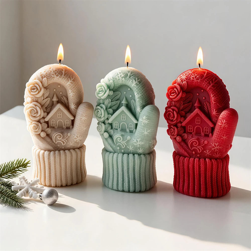 Beige, green and red Christmas cottage mitten candles arranged together
