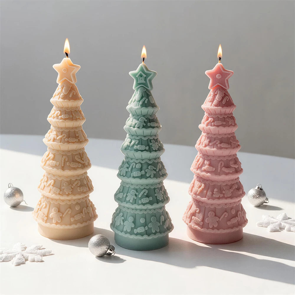 Star-topped gingerbread garland tree candles in cream, green and pink