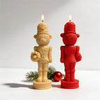Rear view of cream and red bear nutcracker soldier candles