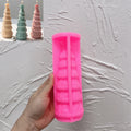 Pink silicone gingerbread garland Christmas tree mold held open