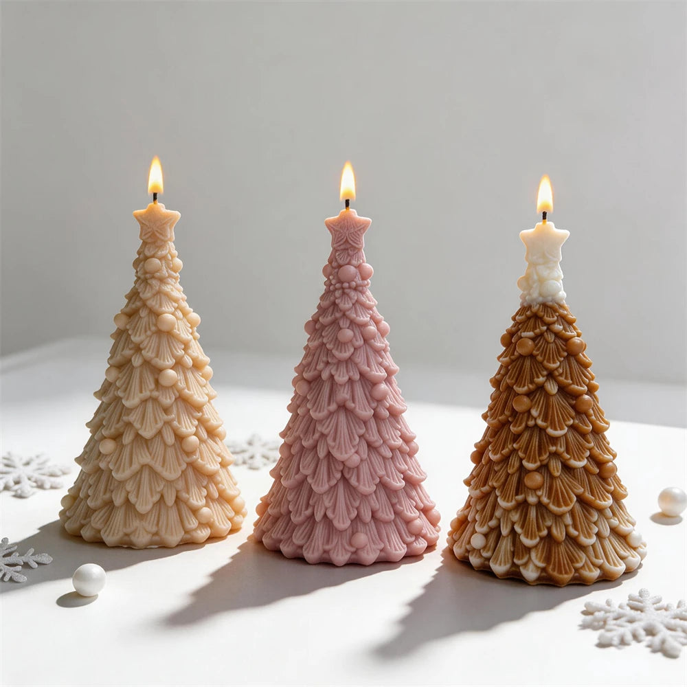 Three star-topped tree castings with round ornament details