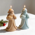 Ivory and pale blue long-robed Santa Claus candle castings