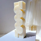 Upright serpentine pillar casting with ribbed S curves