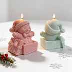 Side and rear views of gingerbread character emerging from a gift box
