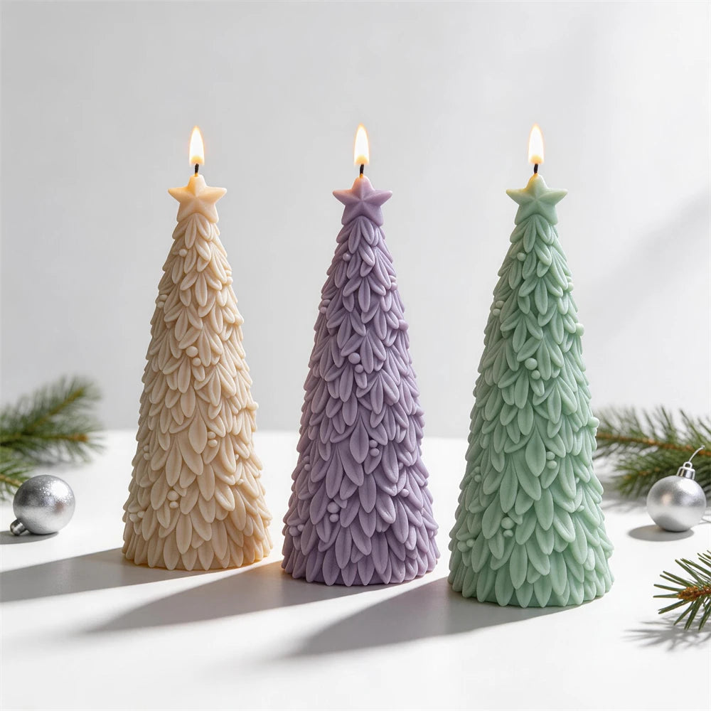 Cream, purple and green fir tree candles topped with small stars