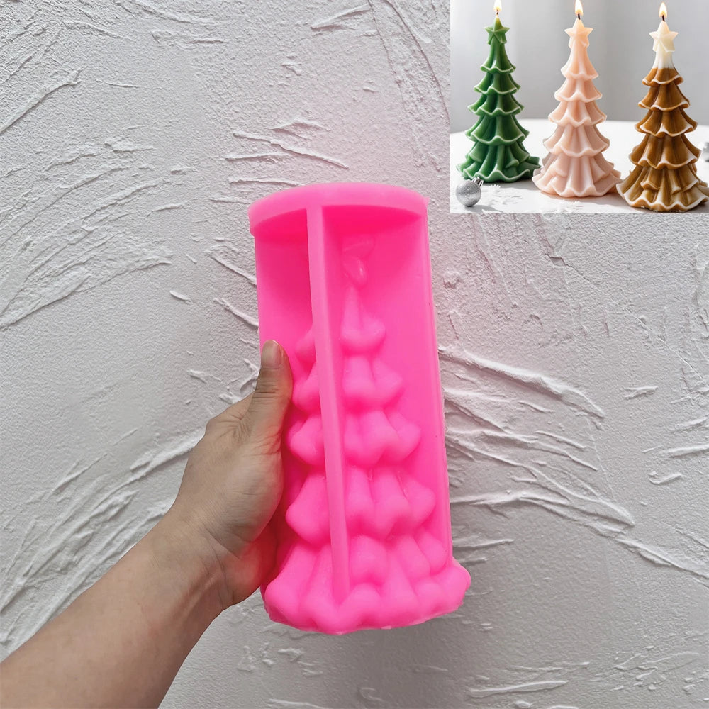 Pink scalloped Christmas tree silicone mold held in one hand