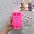 Pink silicone mold for rounded winter bird with hat and scarf
