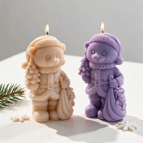 Cream and lilac Christmas bear candles carrying trees and sacks