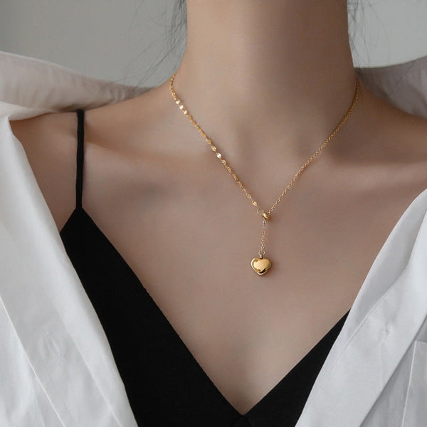 Golden heart pull necklace Obsesie