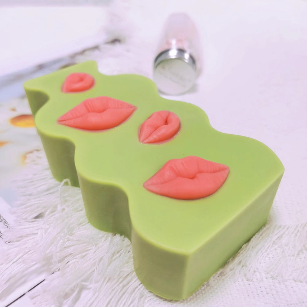 Lips plaque lying flat with raised mouth details