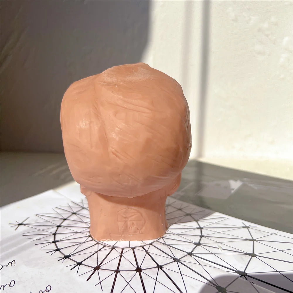 Rear view of the head casting showing hair texture