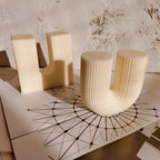 Smooth square U and rounded ribbed U castings shown together