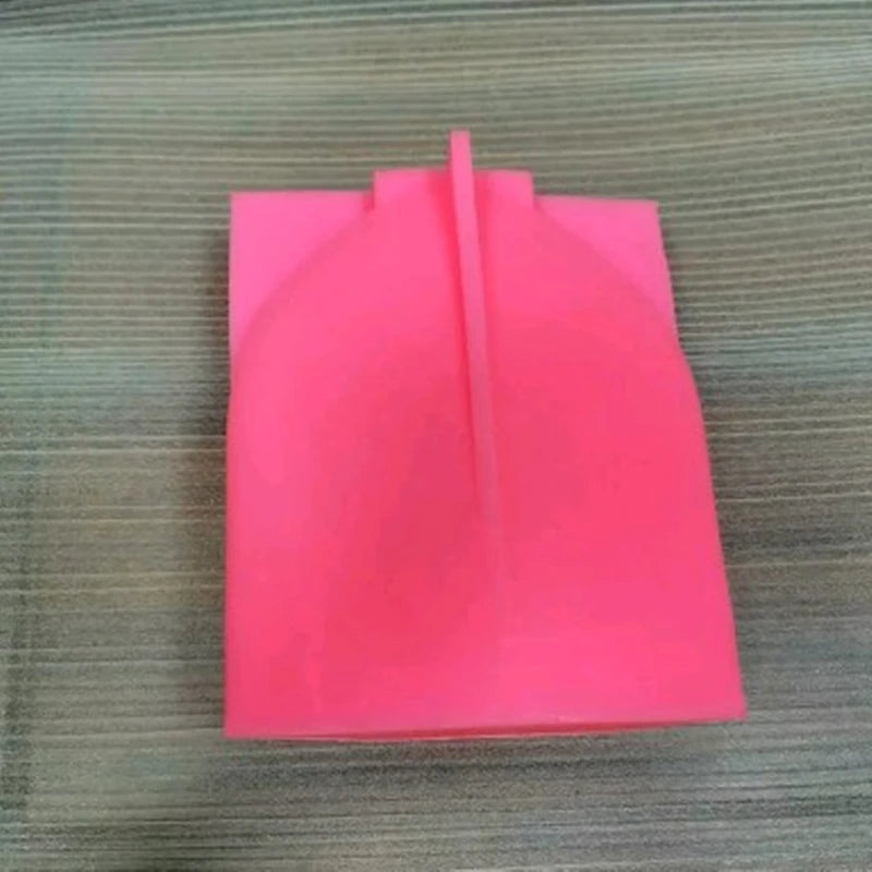 Pink rectangular silicone mold photographed from the exterior
