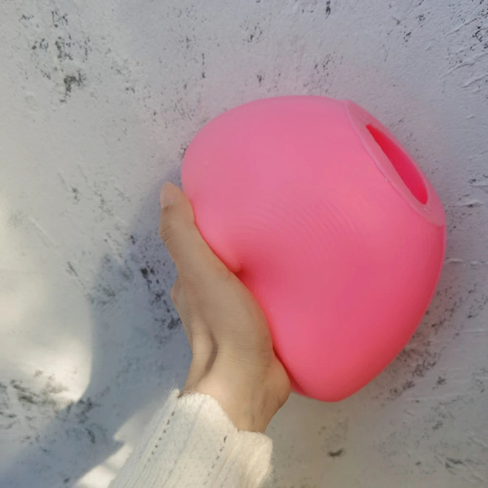Pink silicone mold for casting the curved abstract double-opening vessel