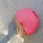 Pink silicone mold for casting the curved abstract double-opening vessel