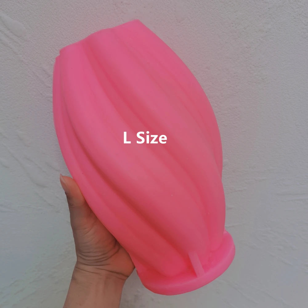 Pink Large twisted-rib oval mold held upright