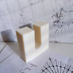 Smooth square-edged U candle casting with flat faces