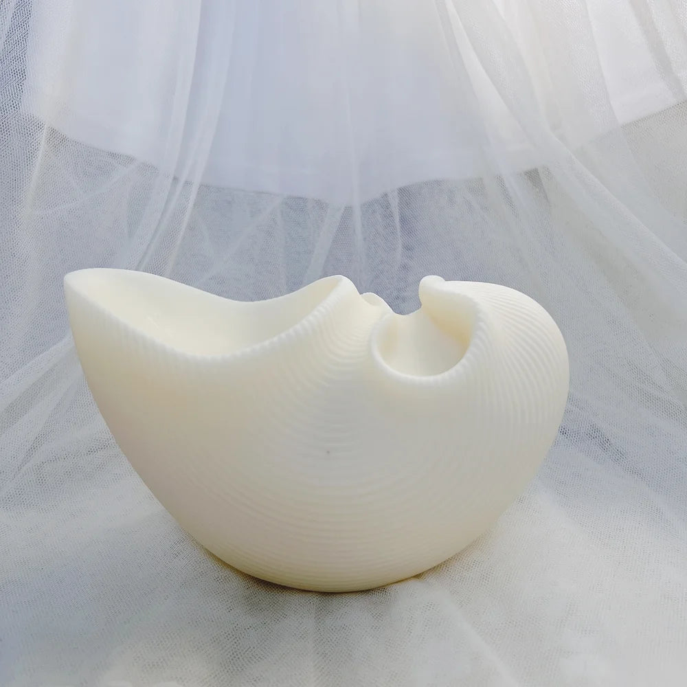 White abstract double-opening vessel casting viewed in profile