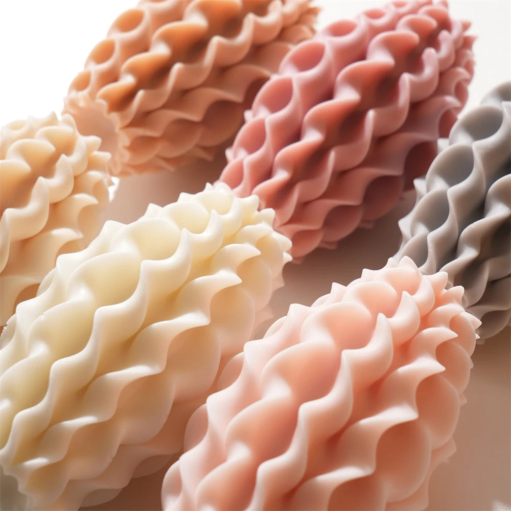 Close-up of sculptural pillar castings with deep wavy ridges